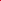 A close-up of Super Cheap Fabrics’ Plain Cotton - Watermelon (150cm), lightweight and fiery red, twisted into a spiral to reveal smooth, flowing folds and creases.