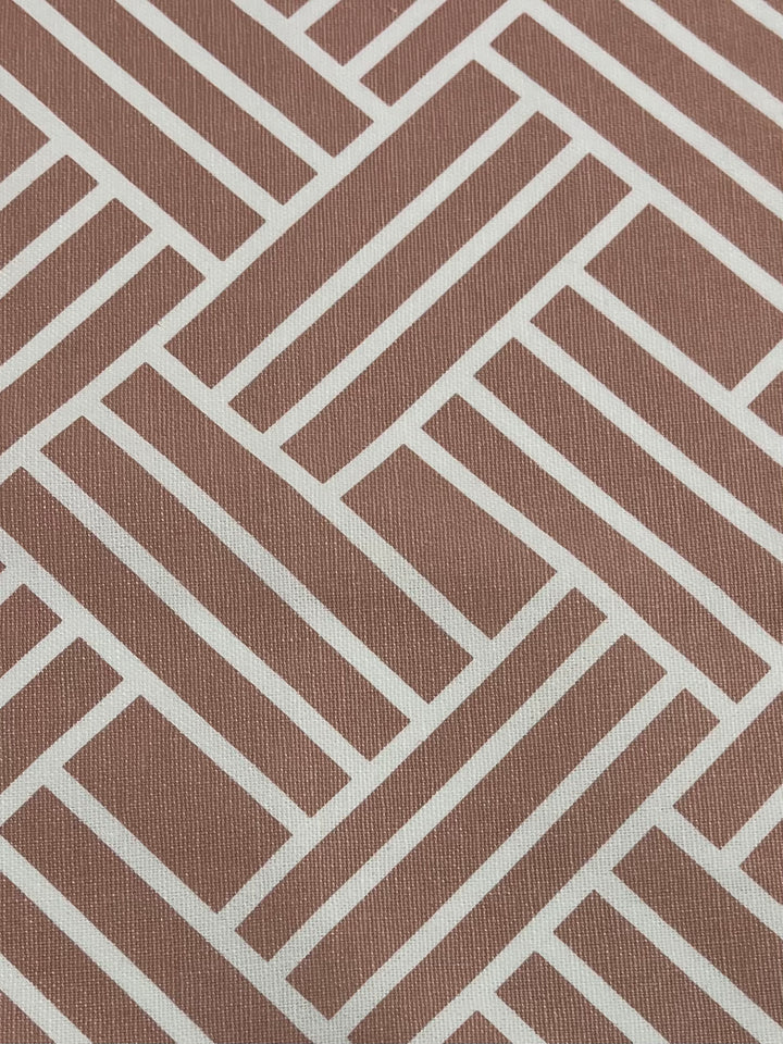 A close-up of Super Cheap Fabrics' Printed Canvas - Chopped - 145cm with a geometric pattern. The design consists of brown rectangles intersected by thin white lines, creating a maze-like, interlocking effect that is perfect for arts & crafts or home décor projects.