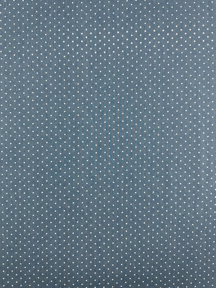 Chambray - Blissful Spot - 150cm by Super Cheap Fabrics features lightweight blue chambray with evenly spaced small white polka dots.