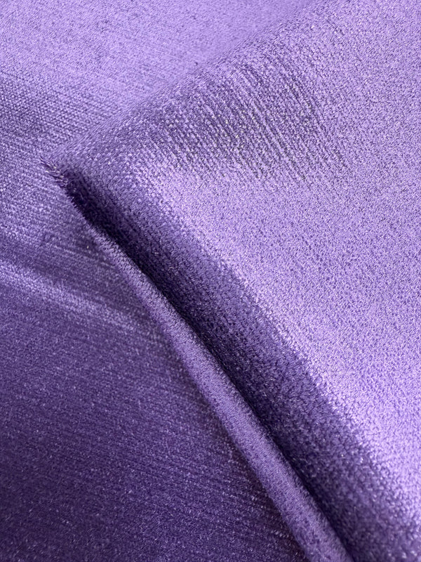 Close-up of Super Cheap Fabrics’ Cotton Velvet - Ultra Violet - 150cm, highlighting its heavy weight, rich vibrant color, soft and smooth texture with a subtle sheen and visible fibers.