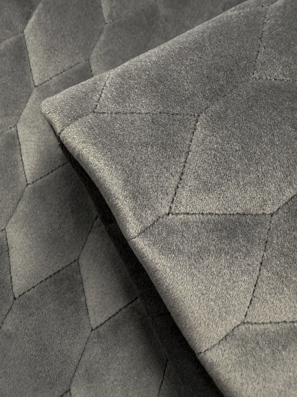 Close-up of Super Cheap Fabrics' Quilted Velvet in Vintage Khaki (145cm), featuring a soft, plush texture and geometric hexagonal stitching—perfect for upholstery or home decor projects.