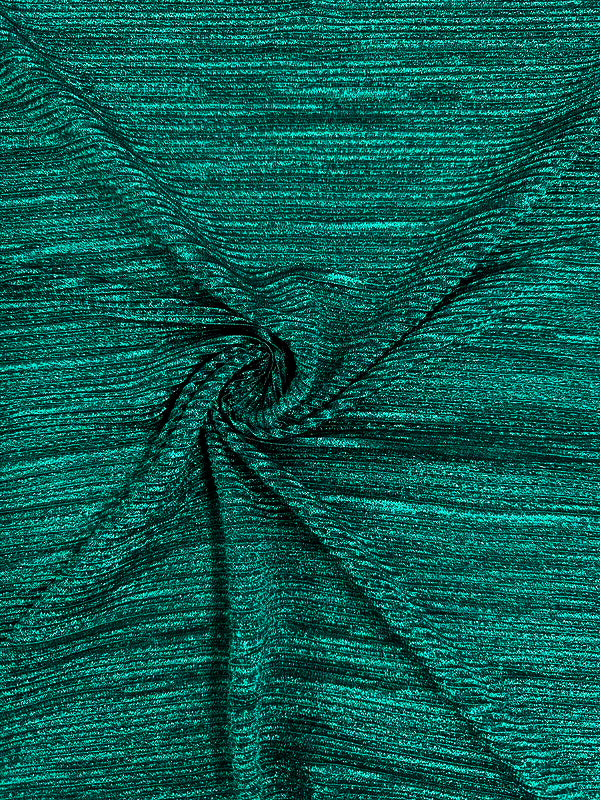 A close-up of the vibrant green "Metallic Knit - Amazon - 150cm" fabric by Super Cheap Fabrics, twisted in the center into a small spiral. The medium to heavy weight knit has a slightly rough texture with subtle horizontal lines, making it an ideal choice for visually interesting tops or dresses.