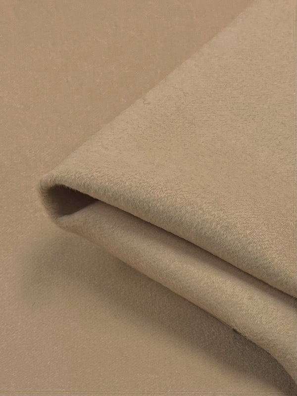 A wool cashmere fabric in a Cream Tan colour. Heavy weight fabric, this fabric has a beautiful feel and is very warm and soft