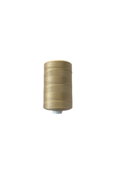 A spool of Super Cheap Fabrics Thread - Latte with a white plastic base is positioned against a plain white background. The sewing thread is evenly wound around the spool.